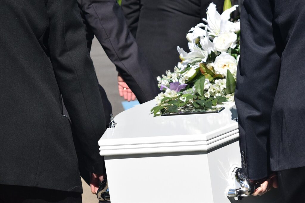 choosing the right funeral, coffin, mourning, ceremony, loss, burial, grief, memorial, casket